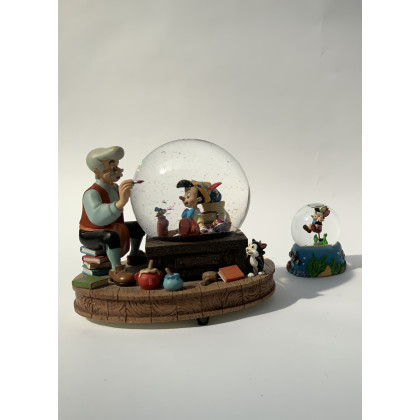 Carillon Disney con snow globe a tema Pinocchio. Vetro e resina